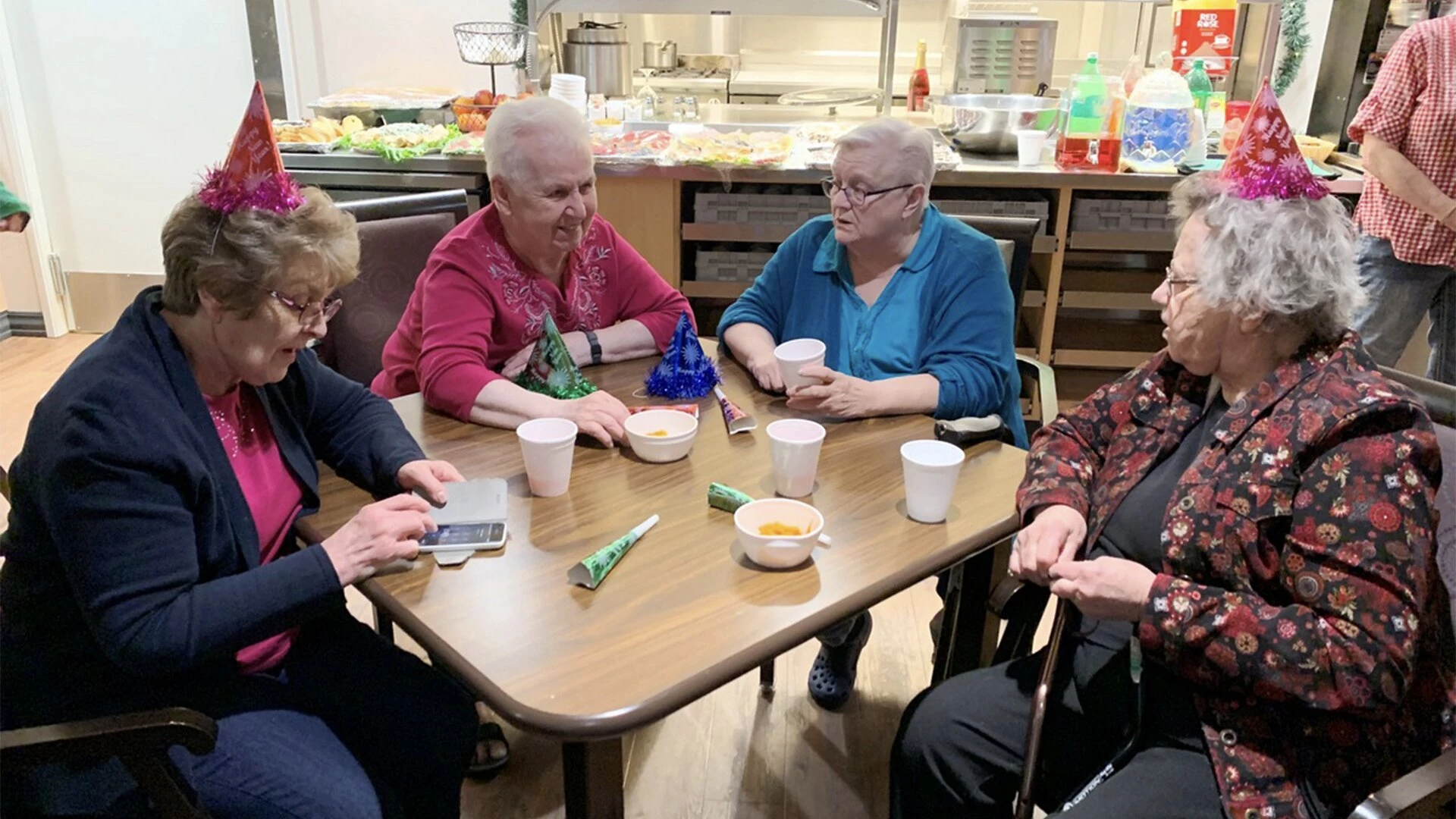 Residents of GS enjoying birthday party at dining area